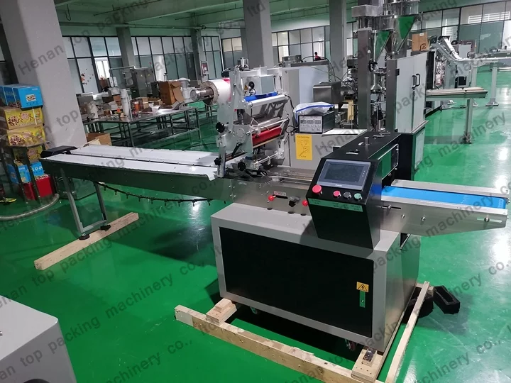 Commercial flow wrap machine